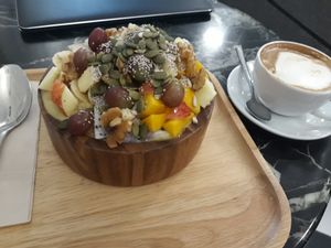 Huge smoothie bowl and latte with soy milk at Coco&Co in Vientiane
