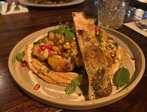 Pikantny kalafior z pomidorowym hummusem (cauliflower with tomato hummus)   at Shuk in Warsaw