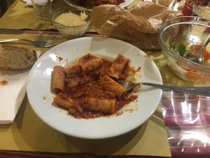 seitan ragu with bread and side salad (all mostly eaten)  at Tandem in Naples