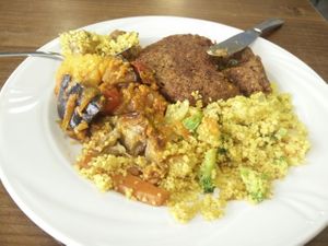 couscous with broccoli, homemade burger and veggies  at Vegan Fresh in Madrid