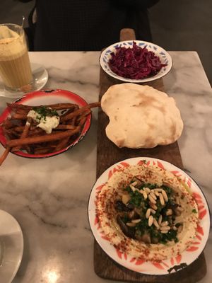 Hummus with eggplants, pita and veggies at Hummus in Delft