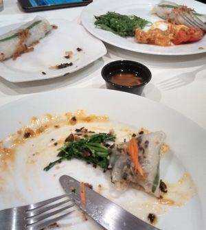 the remains of my rice rolls with the green salad and you can see some carrot/garlic dressing, slightly spicy stir fry with tofu and more green salad in the background. It was all lush!!
  at Nan-yea Market in Madrid