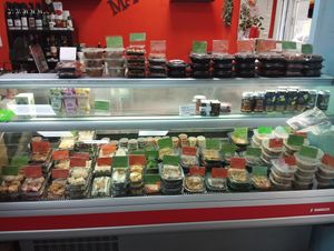 Everything with a green label is vegan! All homemade Chinese dishes. at Nan-yea Market in Madrid