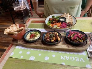 Vegan Buddha bowl, and tapas options (black beans and sweetcorn, Bang bang cauliflower and hummus)  at Lounges - Nautico Lounge in Weymouth