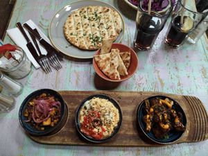 Garlic flat bread + Tapas board: bang bang cauliflower, humous and beans at Lounges - Nautico Lounge in Weymouth
