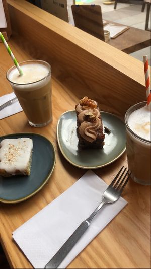 Carrot cake, lemon cake, iced flat white at Cartwheel Coffee in Nottingham