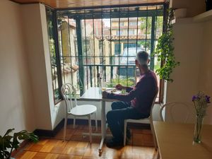 Small room downstairs that faces front at Cardamomo in Bogota