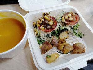 Mini burgers with potatoes and pumpkin soup at Cardamomo in Bogota