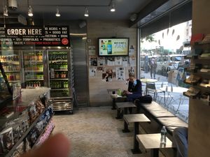 Inside venue; a few places to sit are provided. at Juice Press - Lenox Hill in New York City