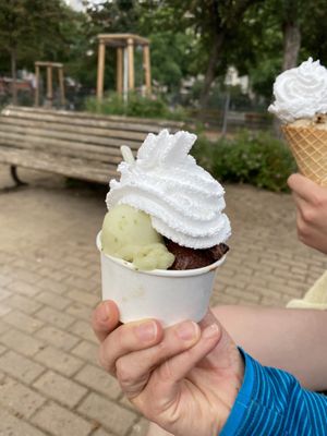 vegan ice cream in a cup with vegan whipped cream  at Balaram Eis in Berlin