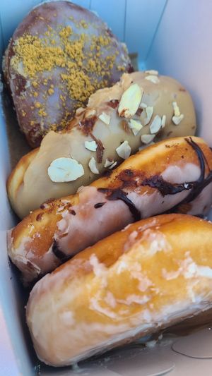 Key Lime, Maple Almond, Vanilla and Chocolate Cardamom donuts at Holey Rollers Bakery in Oklahoma City