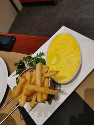 Slices of smoked tofu and bread with vegan cheese at Le London in Calais