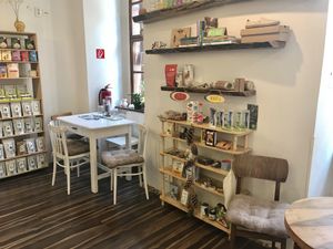 A couple of table and chairs for smoothies and cake at AkoRepa in Presov