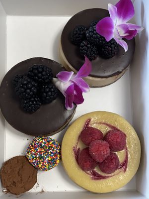 Vegan cheesecakes, sprinkle cookie dough truffle, and chocolate truffle  at Sinners & Saints Desserts in Venice