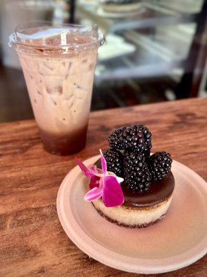 “Vegan Chocolate Coconut Cheesecake” and “Iced Dark Chocolate Mocha Latte” with oat milk   at Sinners & Saints Desserts in Venice
