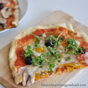 Vegan Rustica pizza with black olives, field mushrooms and fire roasted peppers. (Rocket was added upon delivery) at Zizzi in Chelmsford