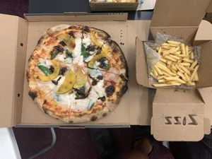 pizza w/ fries at Zizzi - Notting Hill Gate in West London