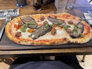 Aubergine and pesto pizza with added meatless meatballs   at Zizzi - The O2 in South East London