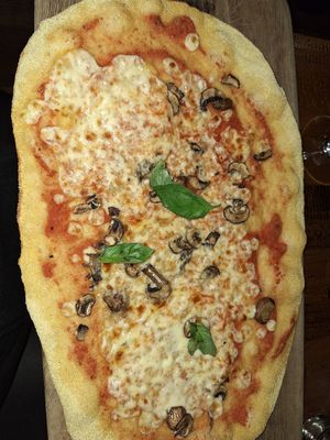 Vegan margarita with mushrooms. I sent it back to get more mushrooms because this was ridiculous. at Zizzi - Piccadilly Gardens in Manchester