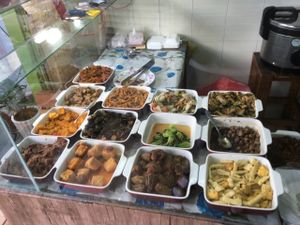 Cafeteria style menu, price per plate 30,000 VND at A Di Da Phat in Ho Chi Minh City