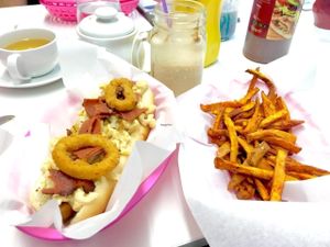 Mac n Cheeze bacn hot dog, sweet potato fries and peanut butter milkshake at The Burger Garden in Sheffield