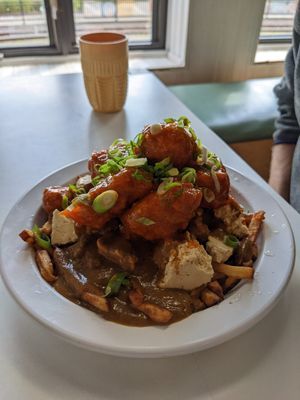 Poutine sauce forestière, tofu squick squick, extra Pas poulet at Cafe Frida in Trois-rivieres
