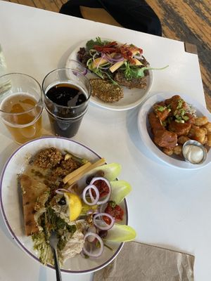 Mostly eaten bread. At the back is the pâté which we didn’t enjoy. Buffalo cauliflower on right was amazing    at Cafe Frida in Trois-rivieres