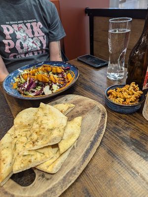 Vegan garlic bread, zucca salad, and complimentary pasta crisps at Zizzi - Meadowhall in Sheffield