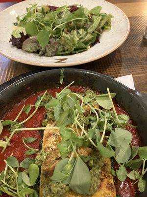 Vegan lasagna (foreground) and vegan risotto    at Zizzi in York