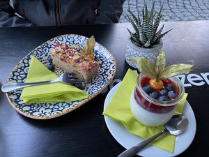 Bananabread and milk rice with strawberry sauce  at Alex Kitchen in Husum