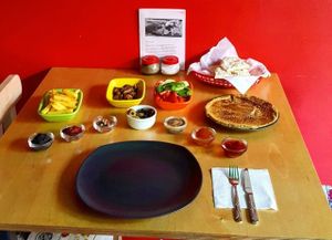 Kahvaltı menüsünde ne mi var? 
Patates, Mantar, Siyah ve Yeşil Zeytin, Acuka, Zeytin Ezmesi, Domates, Salatalık, Biber, Reçeller, Tahin-Pekmez, Ceviz, Peynirli ve Patatesli Patila, Tavada Yaptığımız Bazlama ve Vegan Omlet.

With our breakfast, mornings just got better! French Fries, Sauteed Mushrooms, Mixed Olives, Acuka (A Spicy Red Pepper Spread), Olive Paste, Tahini & Grape Molasses, Tomato-Green Pepper-Cucumber Salad, Jams, Walnuts, Potato and Vegan Cheese Stuffed Flatbreads and Vegan Omlet. at Yasam Vegan Kafe in Izmir