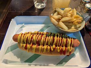 Hotdog and fries at Handmade Burger Co in Sheffield