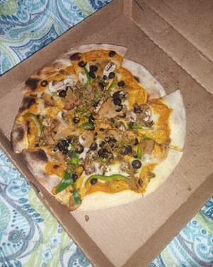 Pizza Suprema at La Esquina Vegana in Heredia