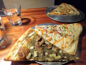 Vegan pizza by the slice at Sizzle Pie in Seattle