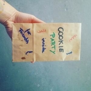 Individual paper bags filled with chocolate chip cookies. at For Friends in Marburg