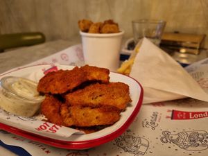 Spicy wings, popcorn chicken, regular fries at Temple of Seitan - Hackney in East London