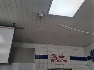 Zoom.in for dust on roof- all that grey tint is dust at Temple of Seitan - Hackney in East London