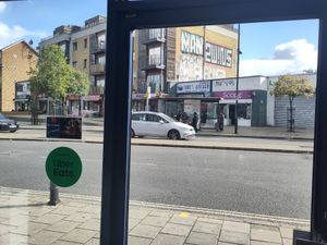 View to outside from counter at Temple of Seitan - Hackney in East London