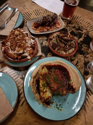 Celeriac steak, pearl barley risotto, loaded potatoes and BBQ tempeh at The Canteen Bar in Bristol