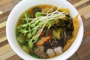 Wonton soup at Jay My Jam Jay. The wontons are so soft and tasty. Here you can´t really see them because I added some sprouts and pickled veggies on top.  at Jai Mai Jumjay in Chiang Mai