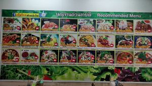 Recommended menu items are on the wall at Jai Mai Jumjay in Chiang Mai