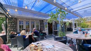 Chester outdoor seating at Chesters by the River in Skelwith Bridge