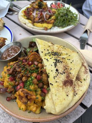 Chickpea curry with naan and potatoes   at Chesters by the River in Skelwith Bridge