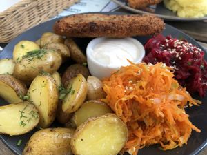 Soy cutlet with potatoes, surowka and vegan cream  at Faloviec Kuchnia Roślinna in Gdansk