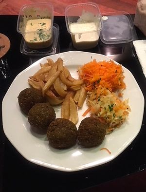 Falafel with hummus and sides. at Faloviec Kuchnia Roślinna in Gdansk