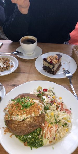 Big potatao with sunflower cream cheese and kale pesto at Faloviec Kuchnia Roślinna in Gdansk
