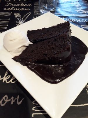 Vegan chocolate fudge cake and coconut ice cream at La Rambla  in Paisley