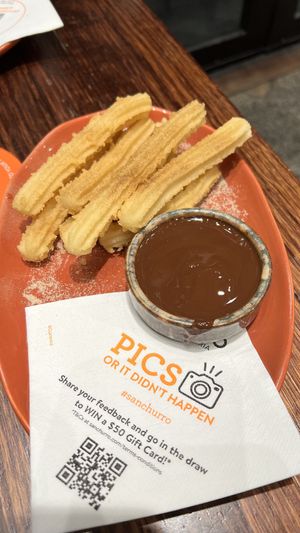 Mini churros with dark chocolate.   at San Churro in Melbourne