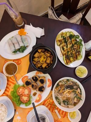 Spring roll clay pot tofu aubergine for noodles at Viet An in Ho Chi Minh City