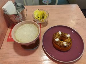 Dona y matcha latte at Frambuesa Pastelería Vegan in Bogota